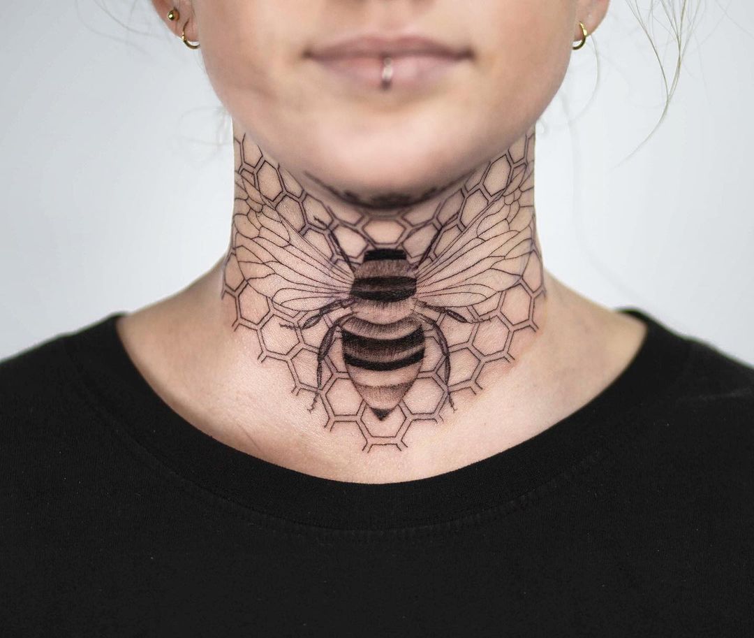 Bee neck tattoo