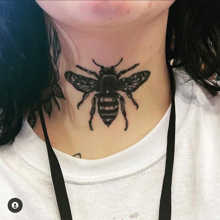 Bee neck tattoo