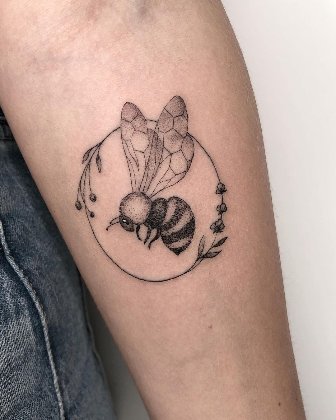Black bee tattoo
