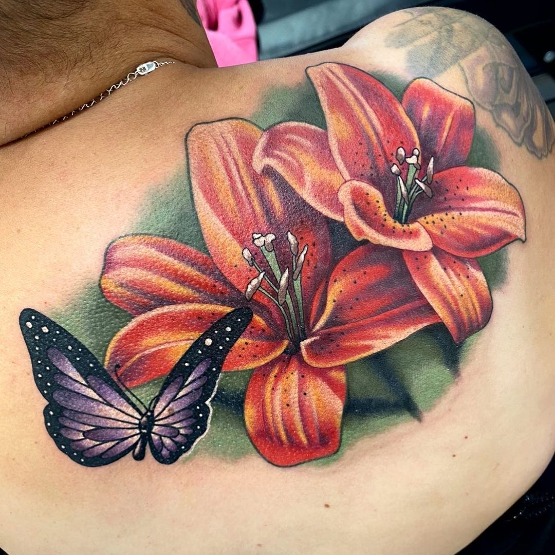 water lily flower tattoo with butterfly