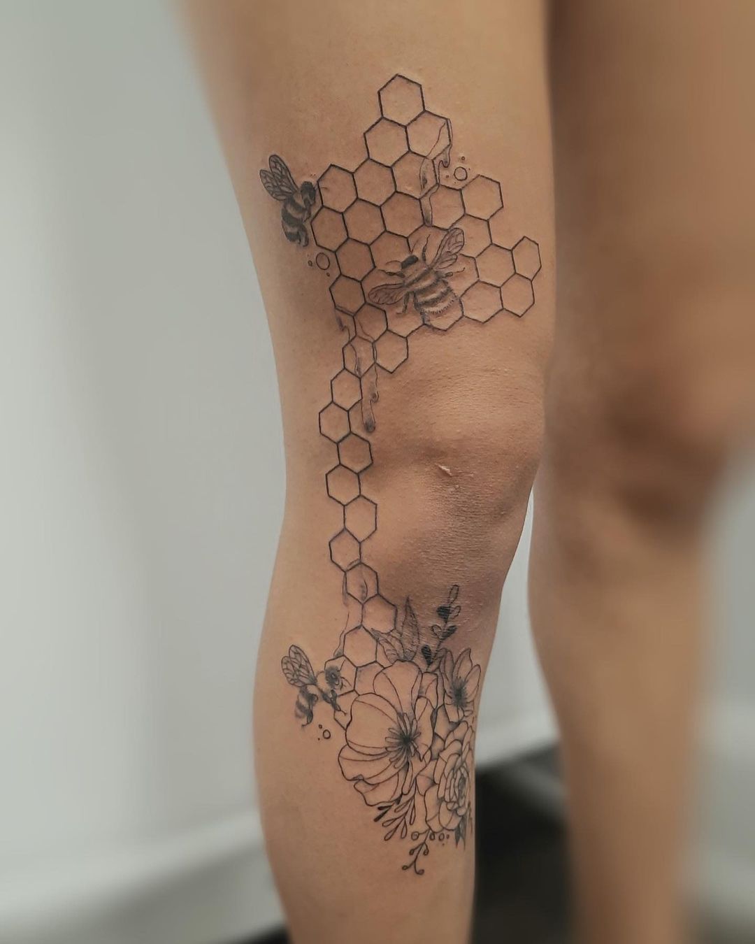 Tatuaje de nido de abeja