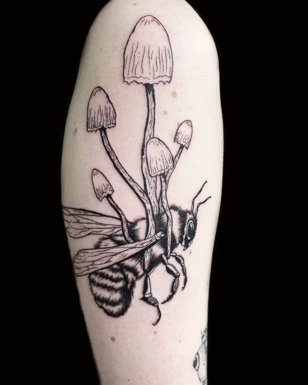 Huge bee tattoo