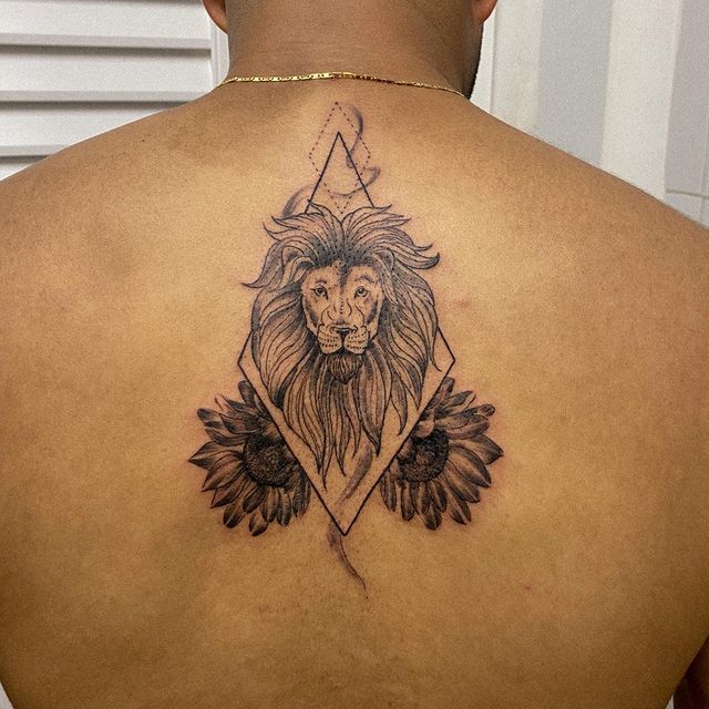Lion in rectangle with sunflower on back