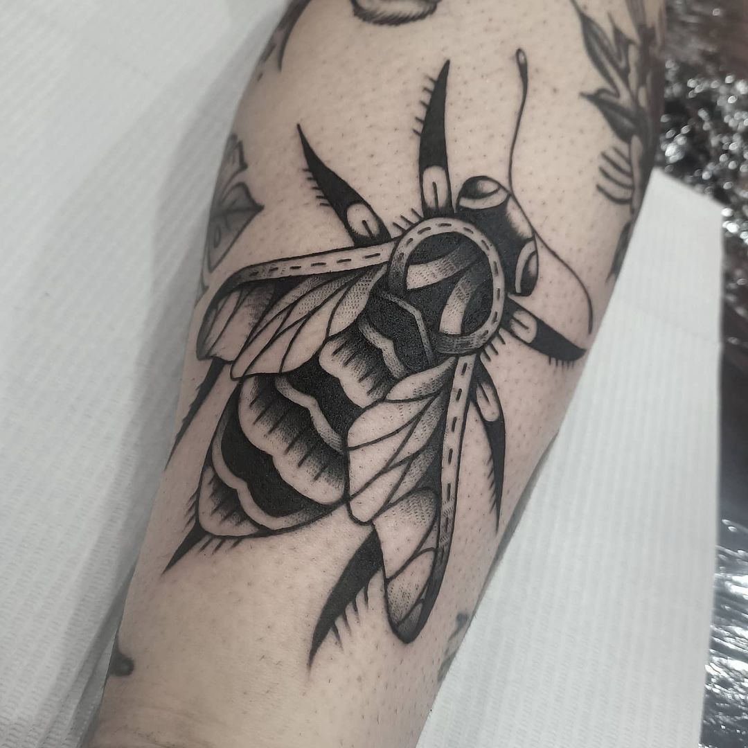 Traditional bee tattoo
