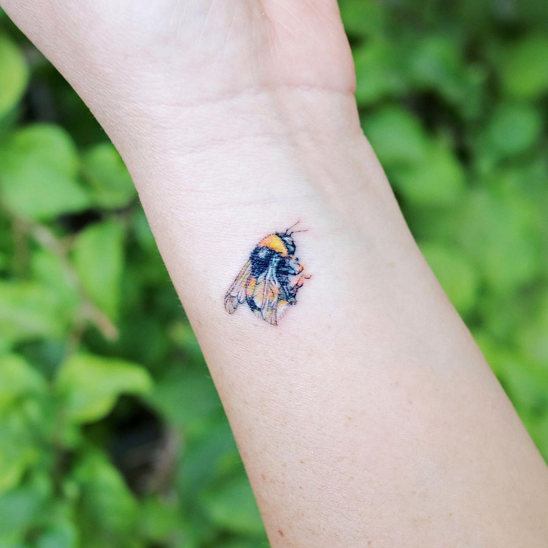 Traditional bee tattoo