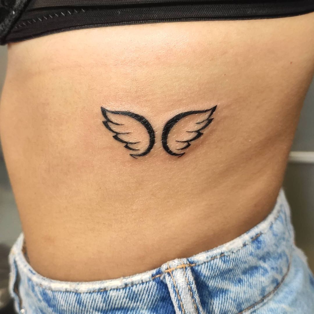 Abstrakte Flügel Tattoo