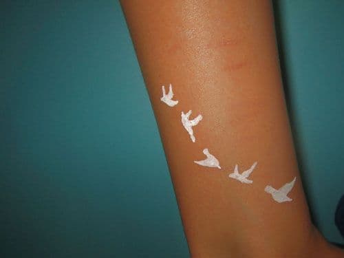 White Ink Tattoos On Dark Skin Hero tattoo Birds 3