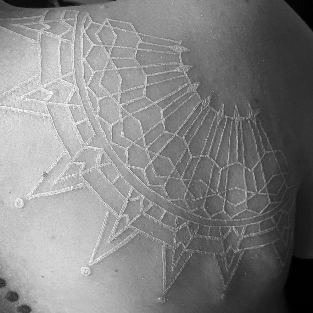 The Best White Ink Tattoos for Dark Skin 30+ Best Tattoo Ideas Hero