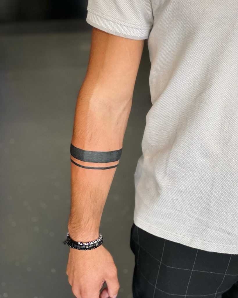 what-do-solid-black-armband-tattoos-mean-hero-tattoo