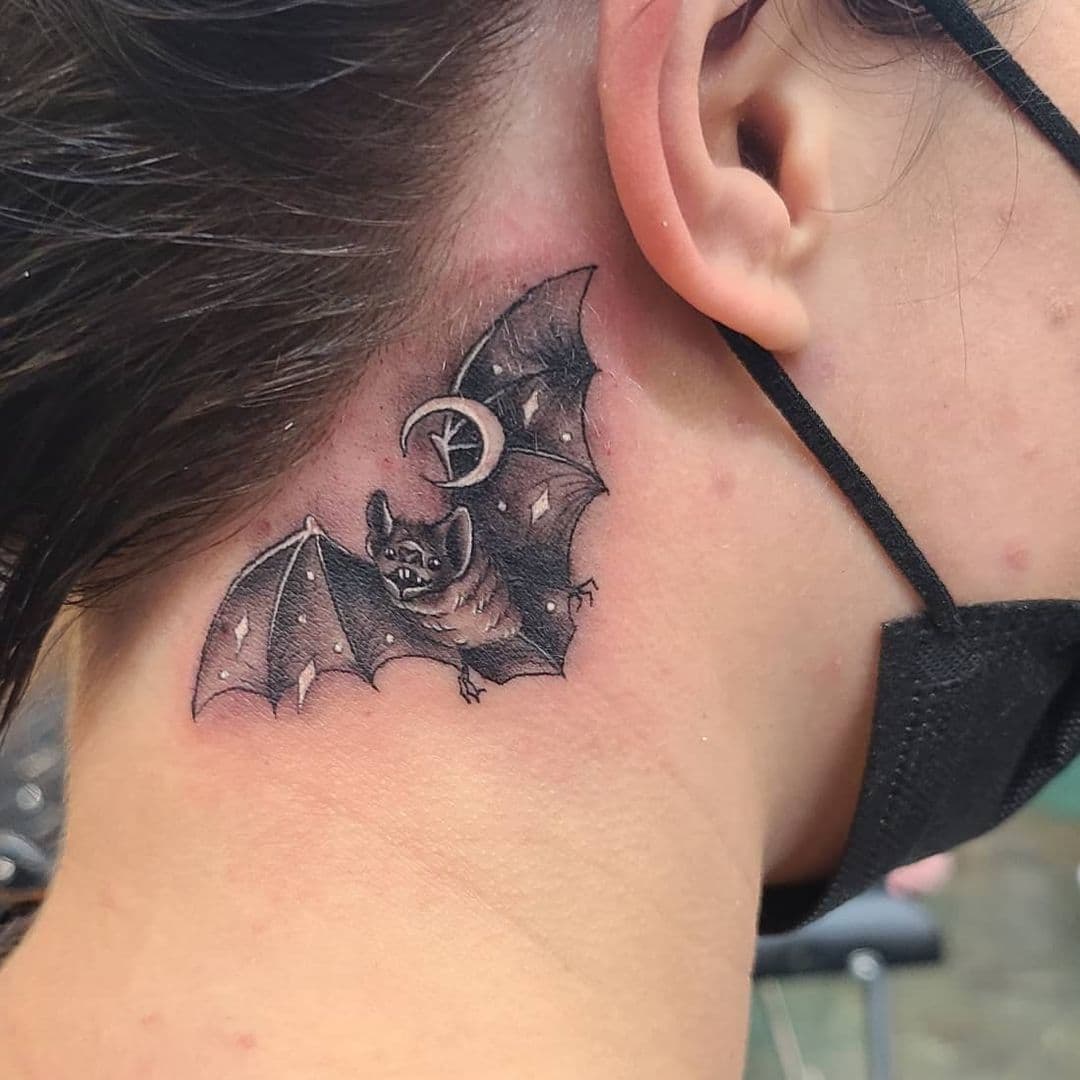 Bat behind the tattoo hero tattoo