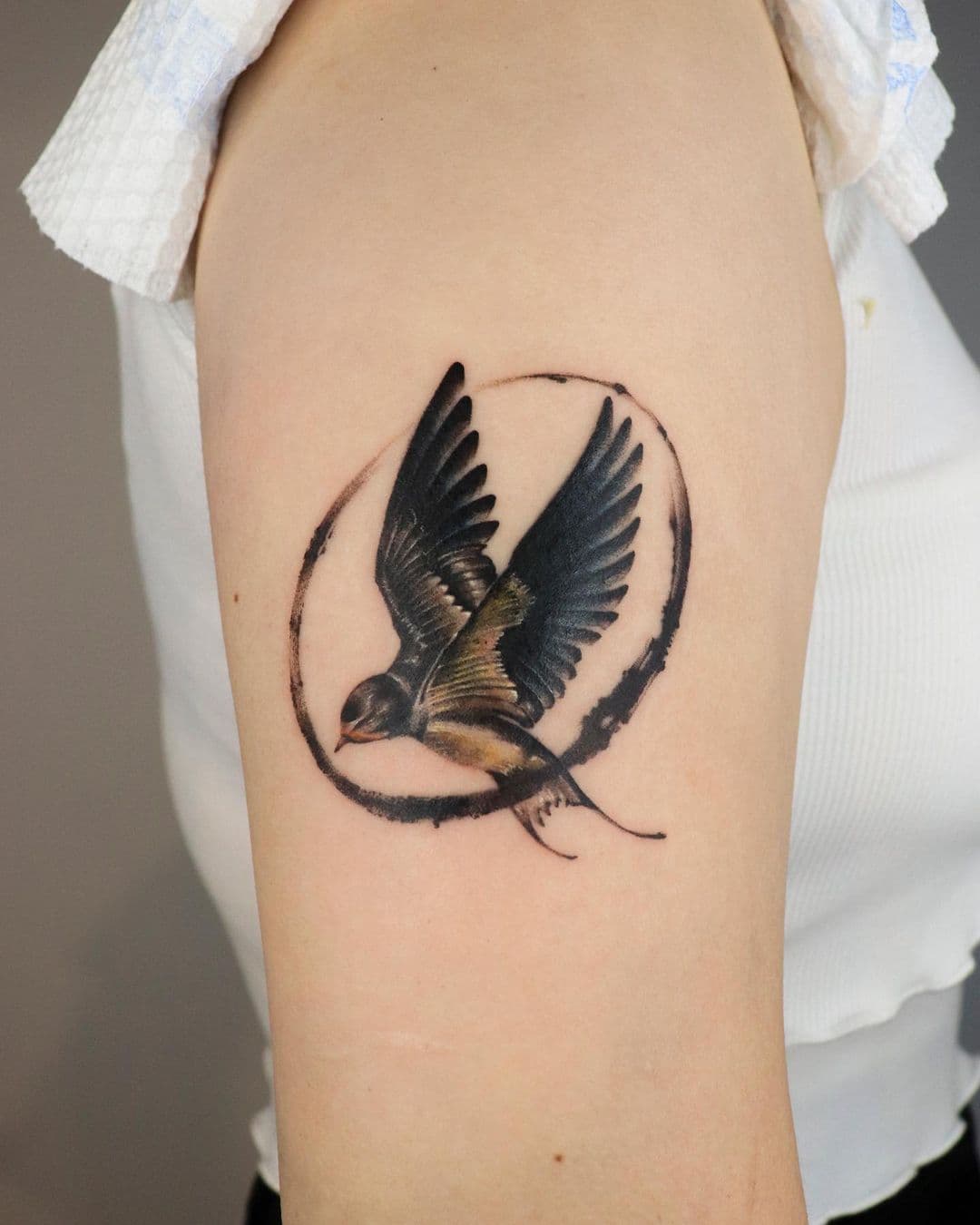Bicep Swallow Tattoo 4