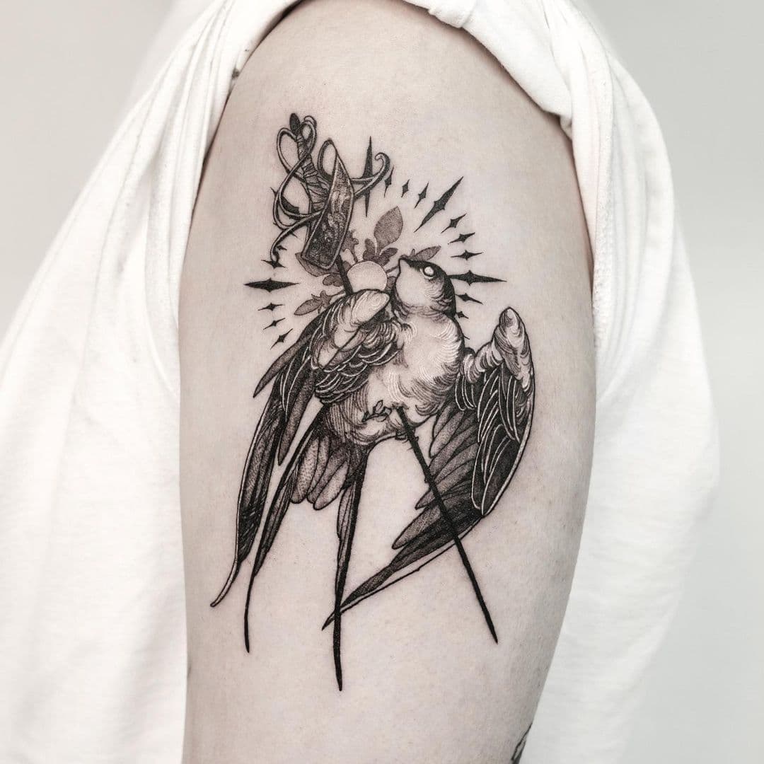 Bicep Swallow Tattoo