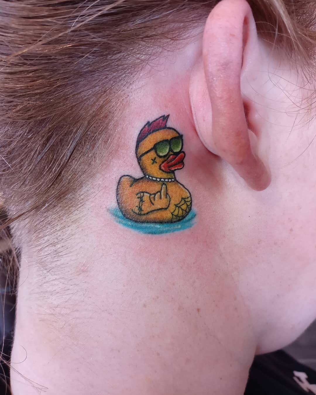 Duck behind the tattoo hero tattoo