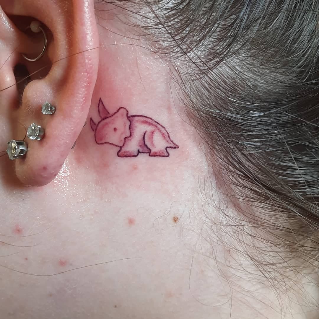 Rhino behind the tattoo hero tattoo