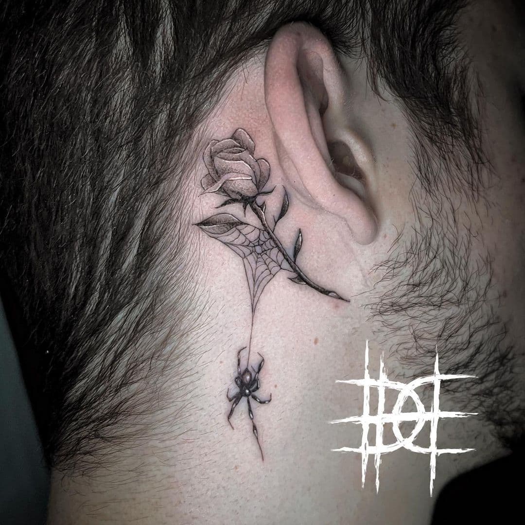 Rose spider behind the tattoo hero tattoo