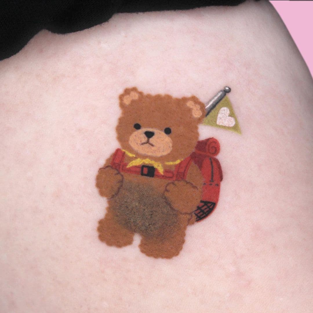 cover Birthmarks with a bear tattoo