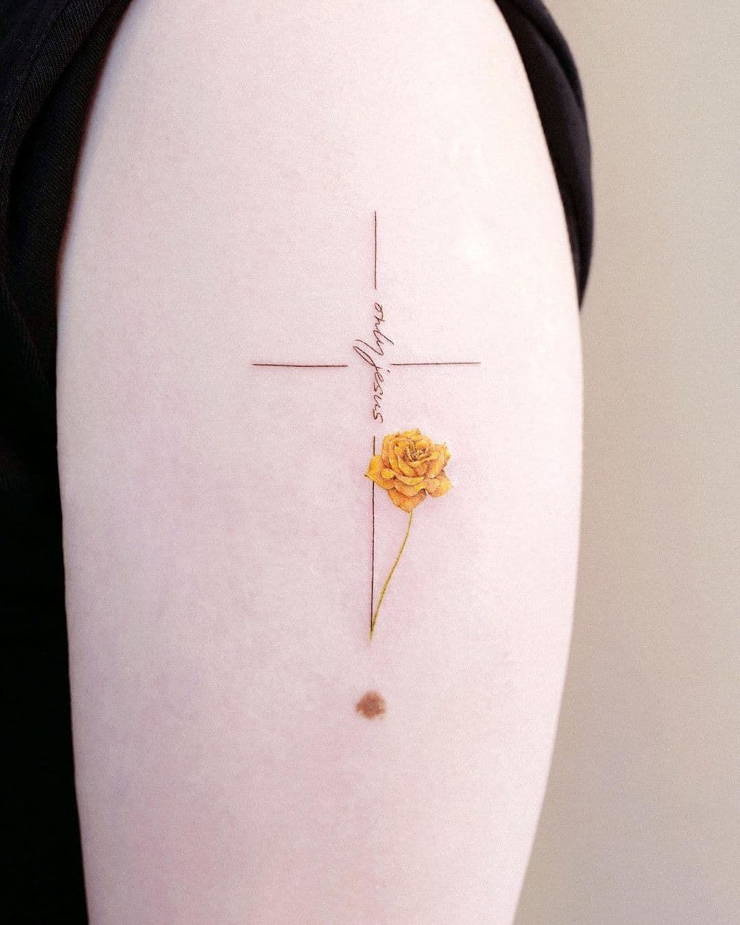 moles yelloe rose tattoo