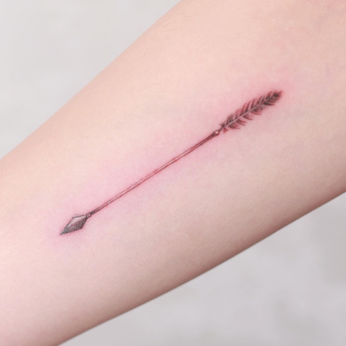 Minimalism Arrow Feather Tattoo