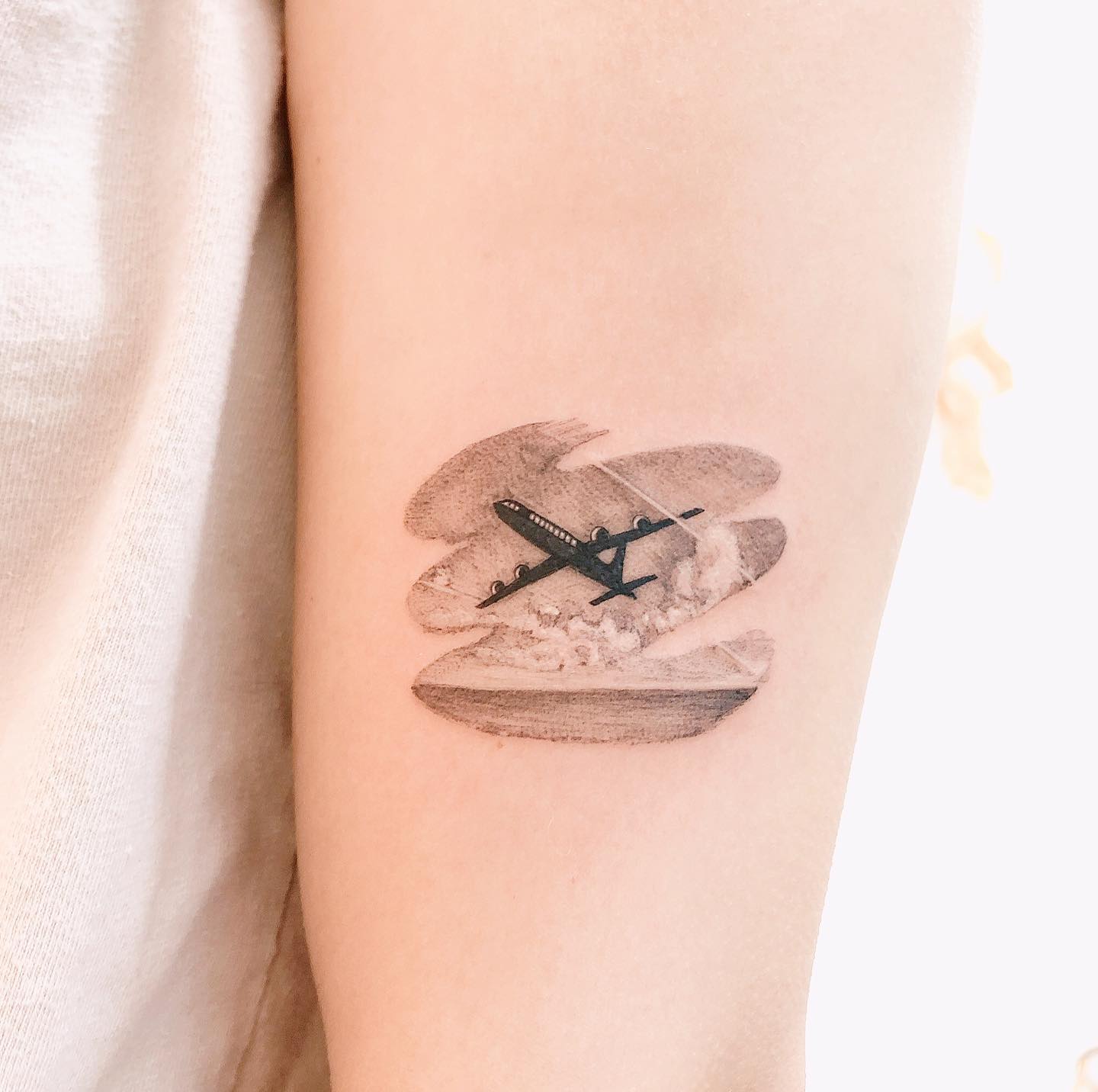 Small Airplane Tattoo Black White