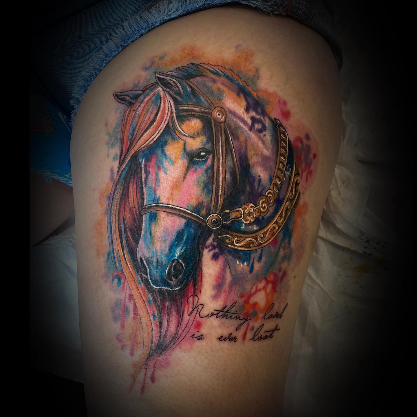 Aquarell Spritzer Frau ein Pferd Tattoo Idee
