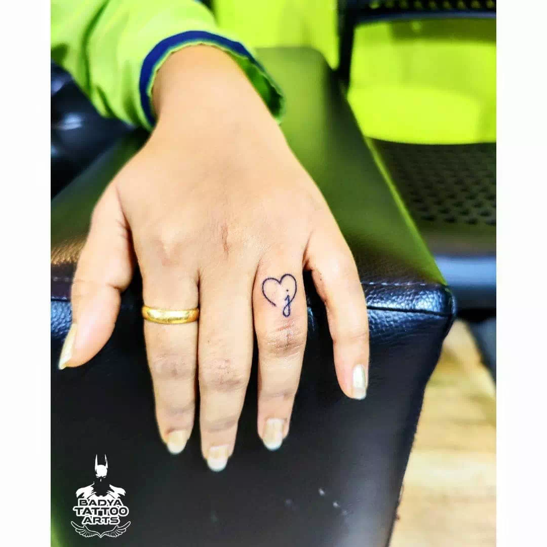 Tiny Heart Tattoos On Finger 1