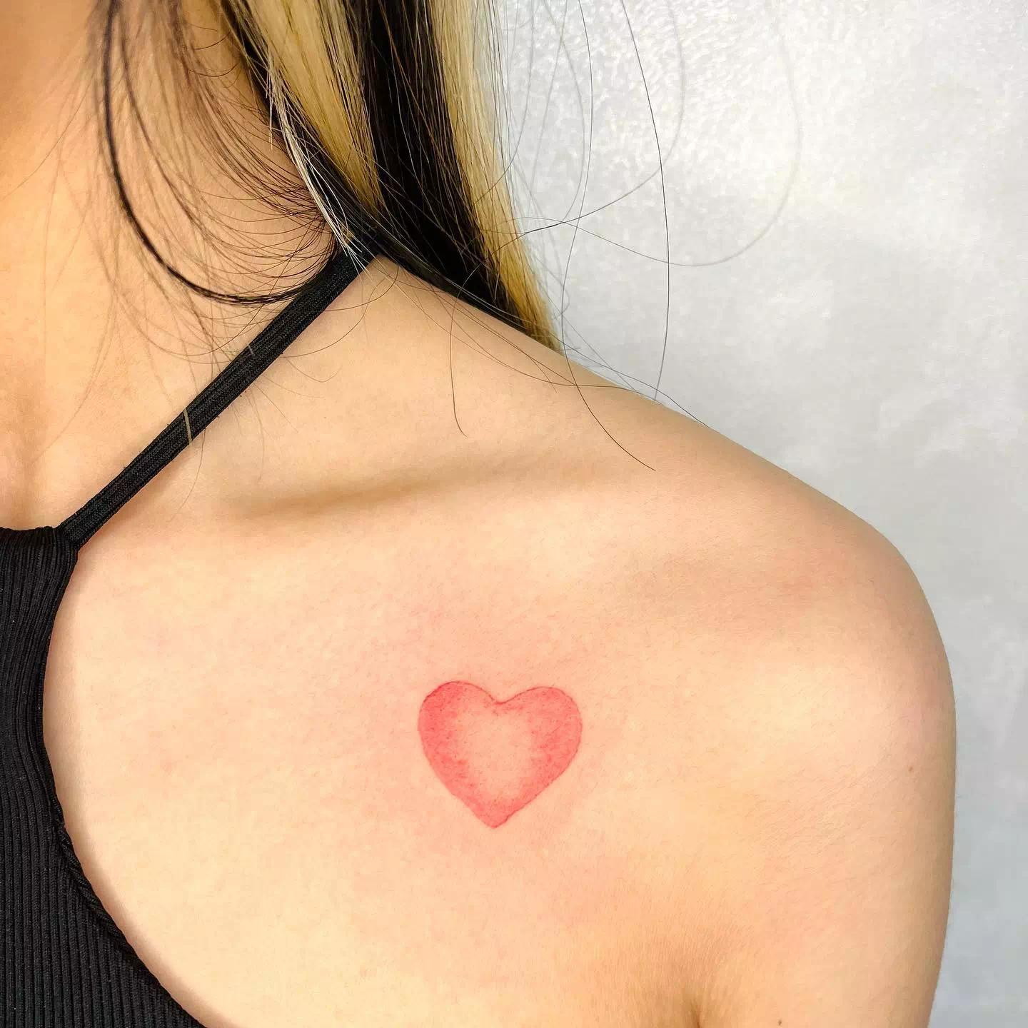 Tiny Heart Tattoos On chest
