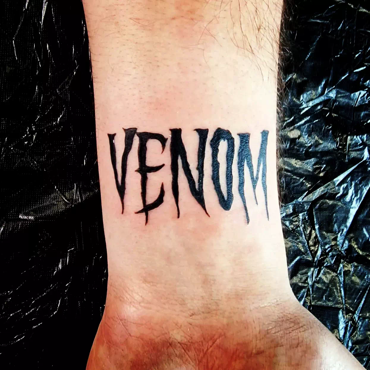Writing Venom Tattoo 1