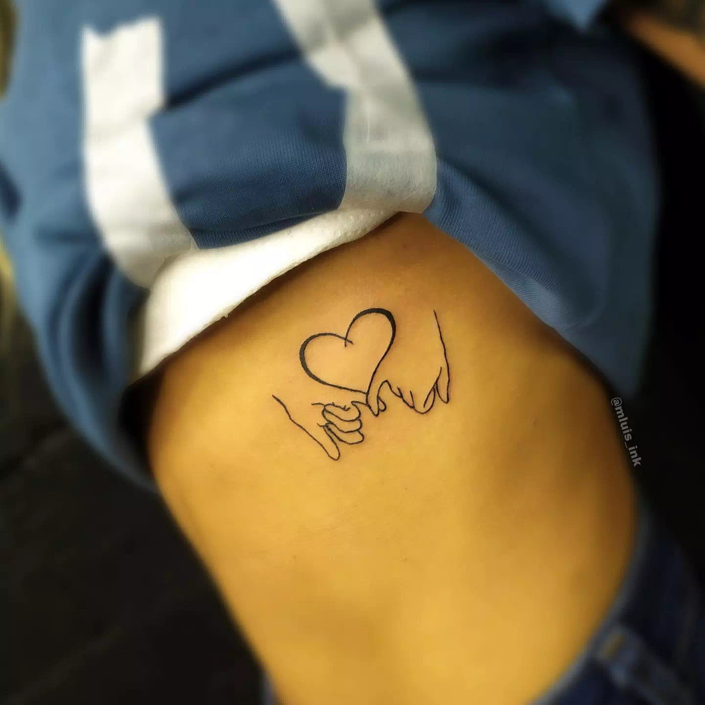 couple heart tattoo woman