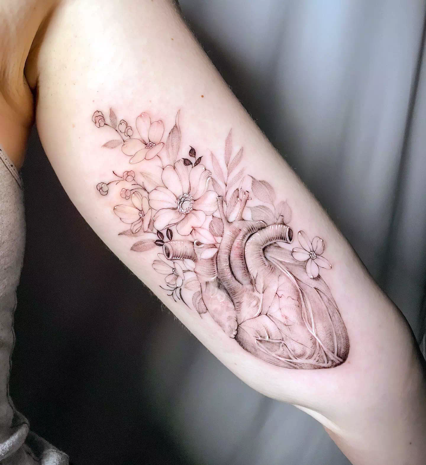 floral anatomical heart tattoo design