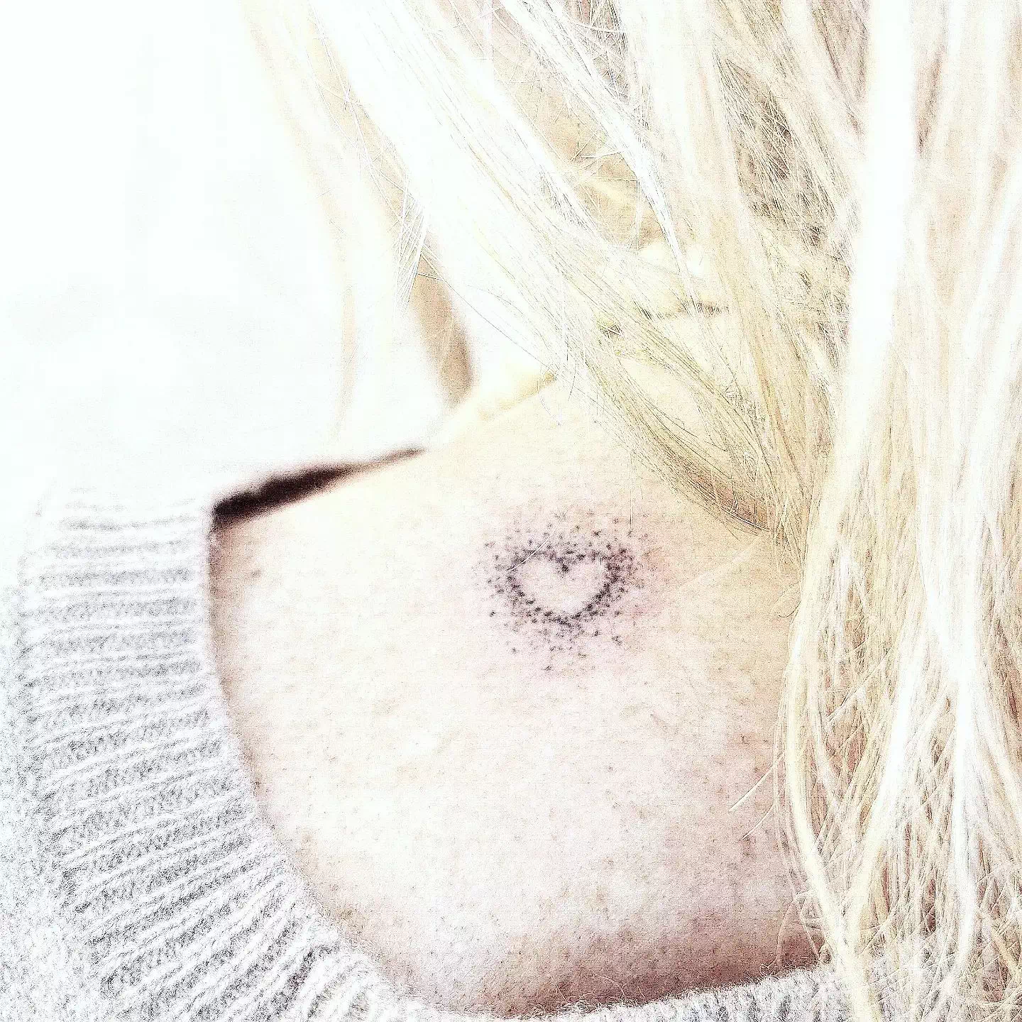 Herz-Tattoo auf dem Rücken