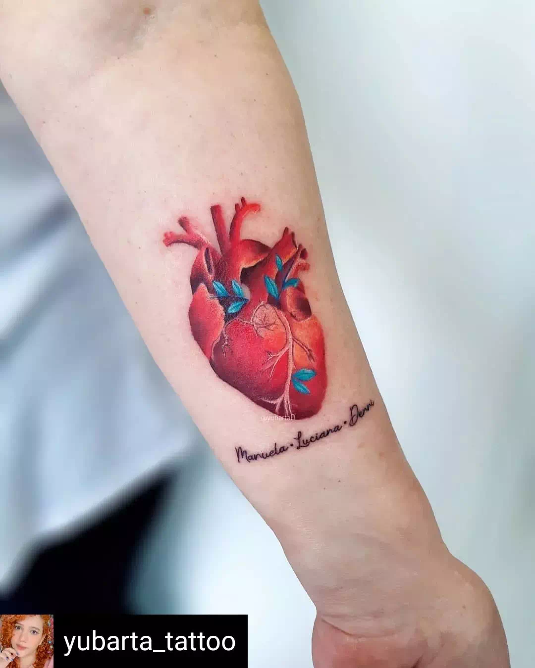 red color floral heart tattoo