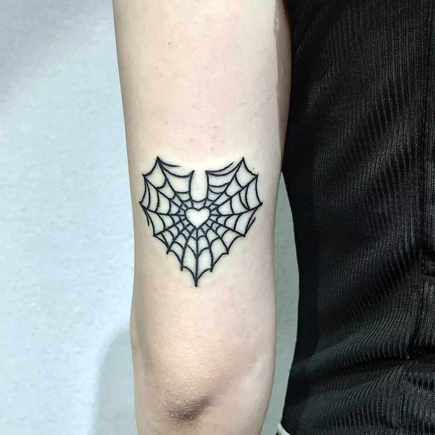 spider heart tattoo