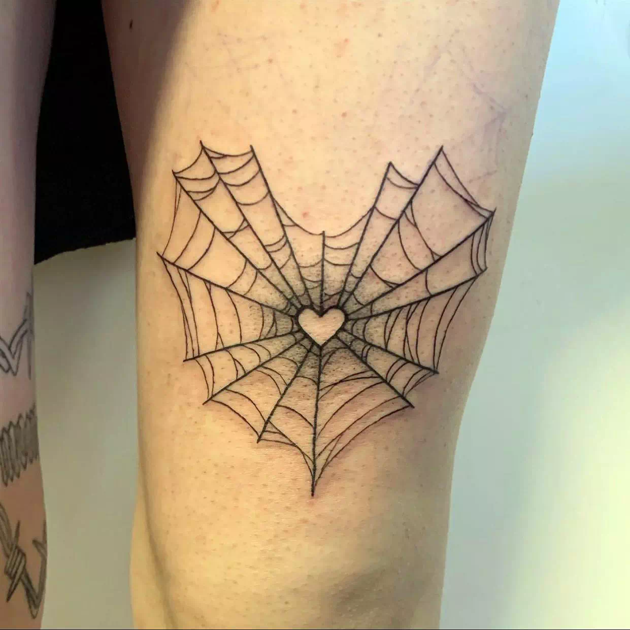 spider web heart tattoo design