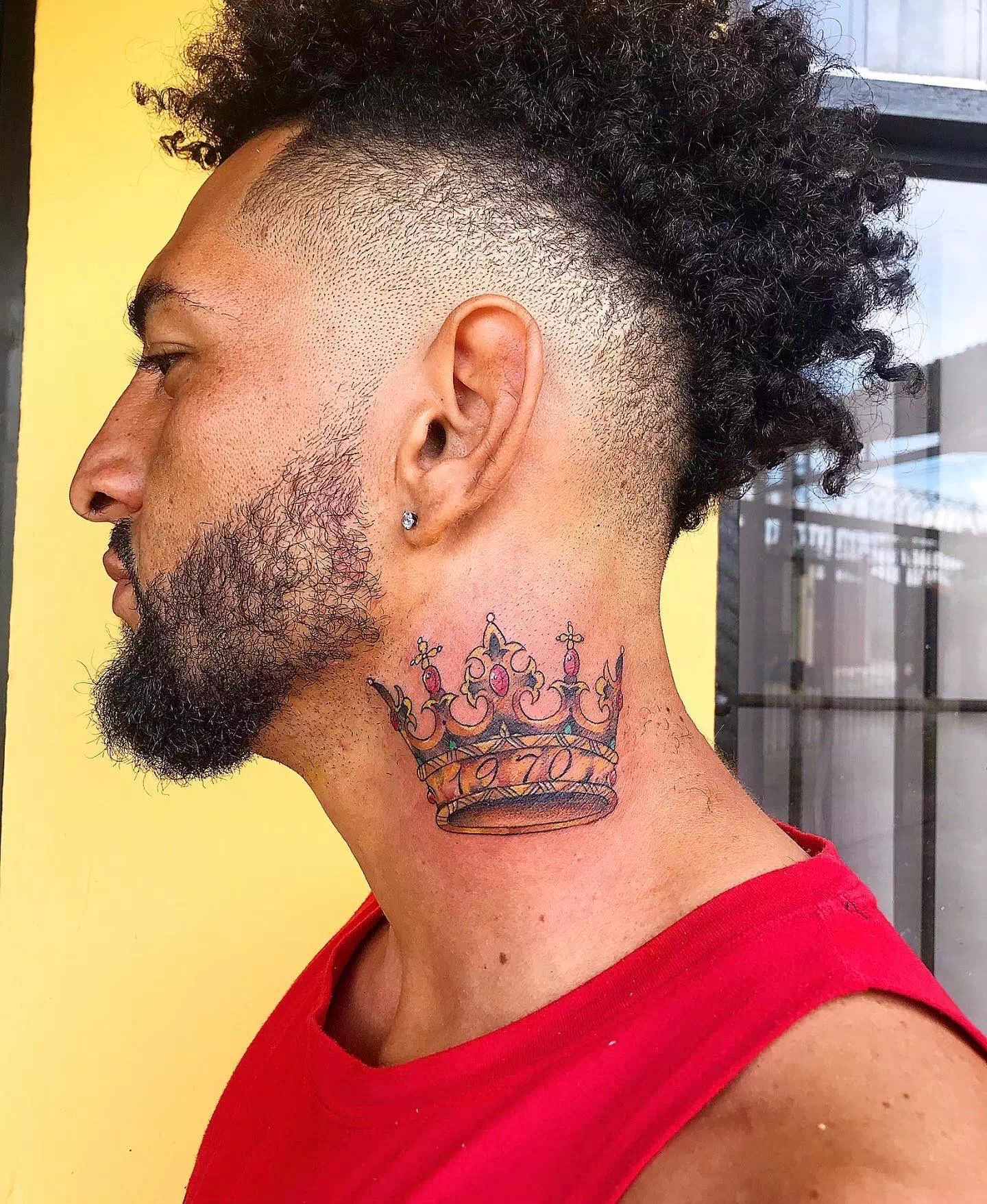 Crown neck tattoo 1