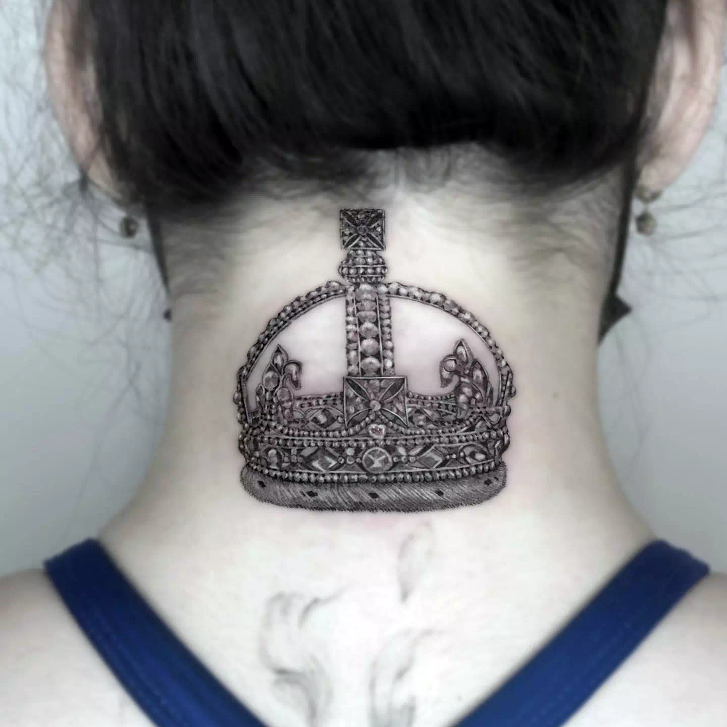 Crown neck tattoo 2