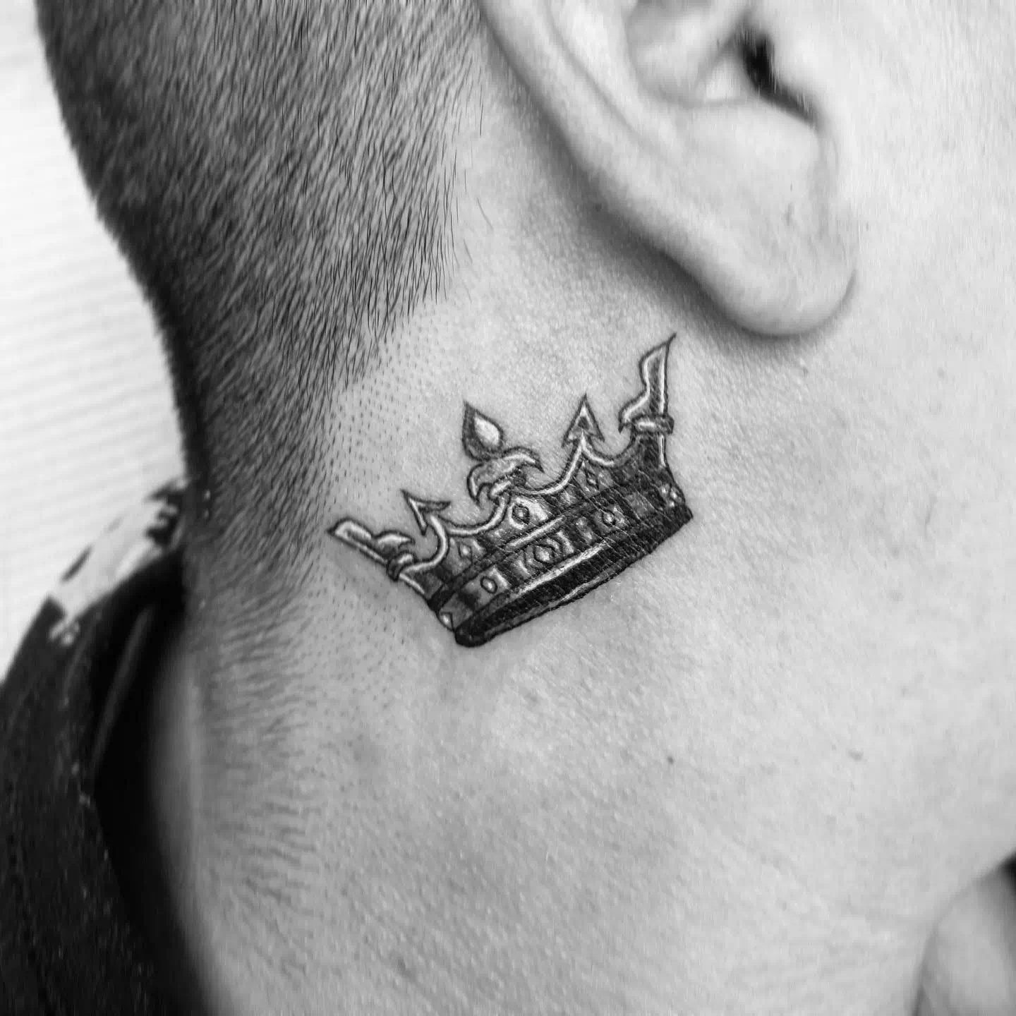 Crown neck tattoo 4