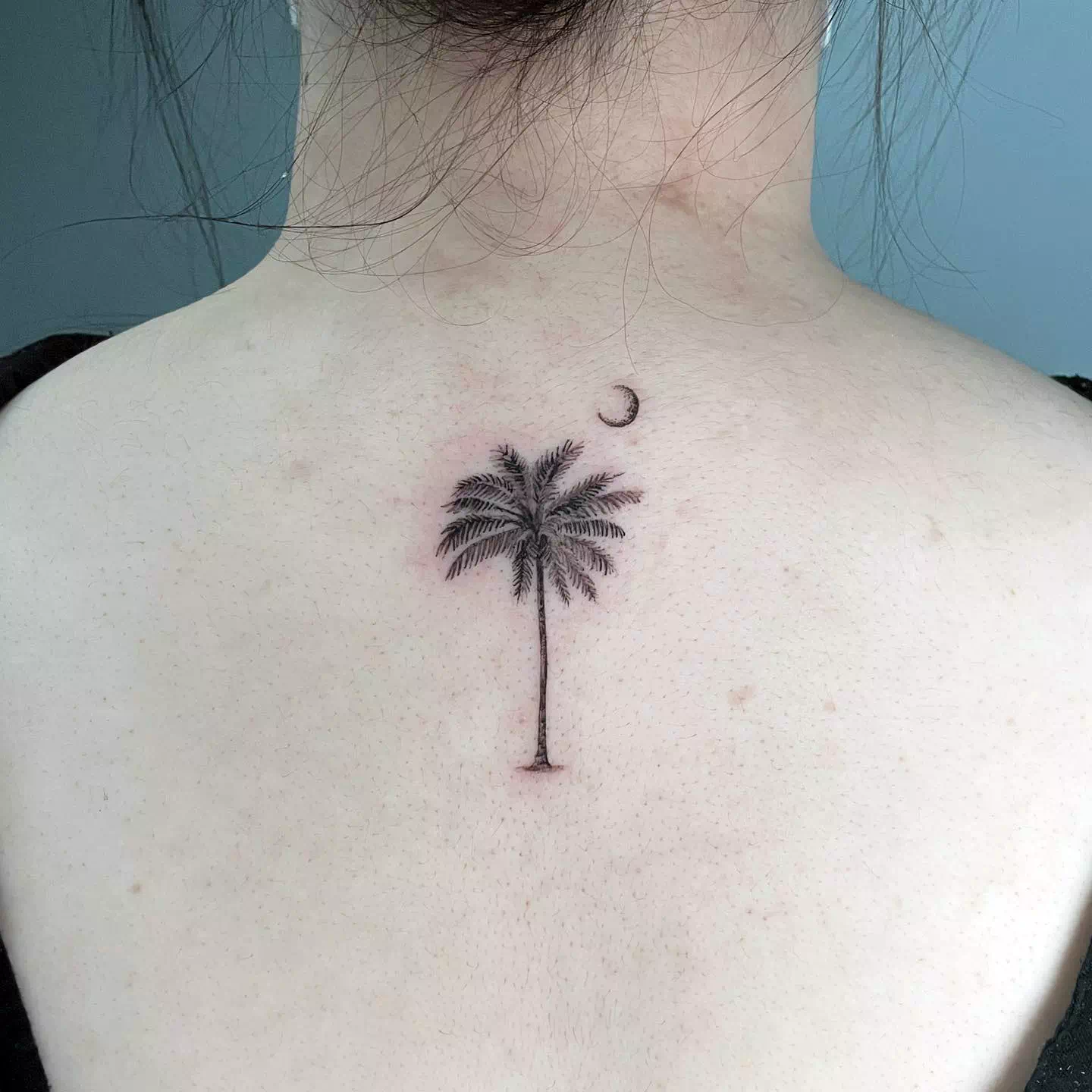 Tatuaje de palmeras en la espalda 2