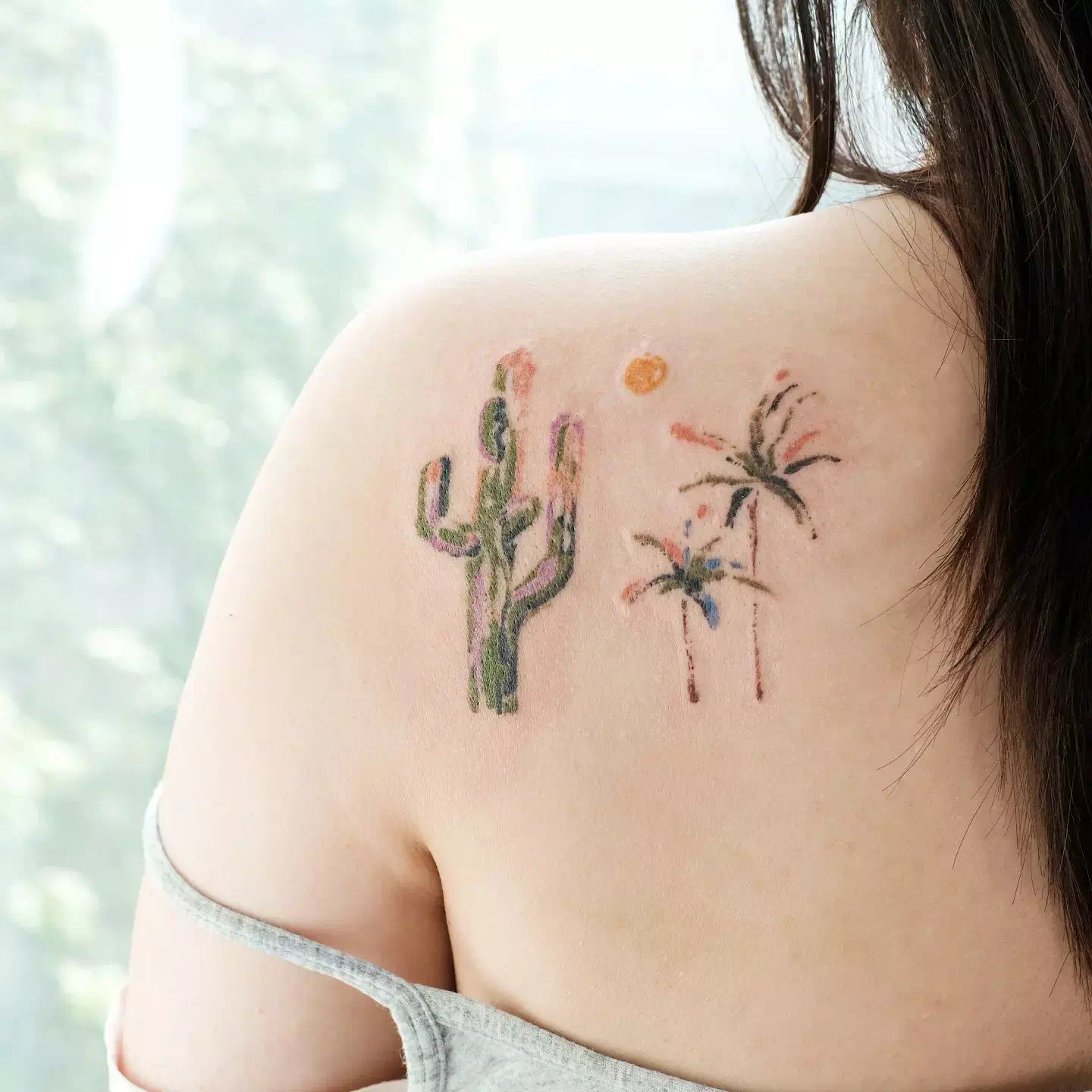 Tatuaje de palmeras en la espalda 3