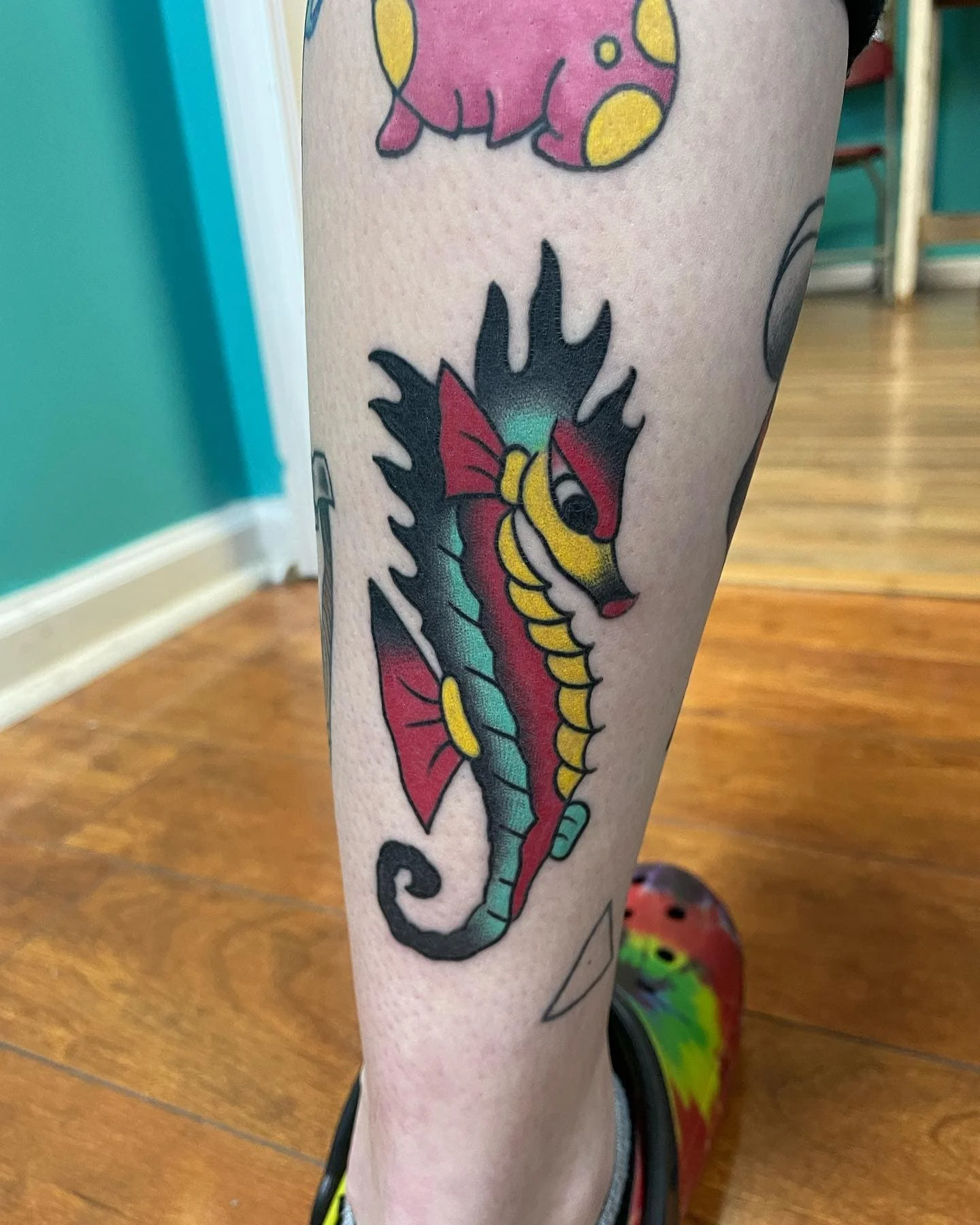 Red Yellow Seahorse Tattoo