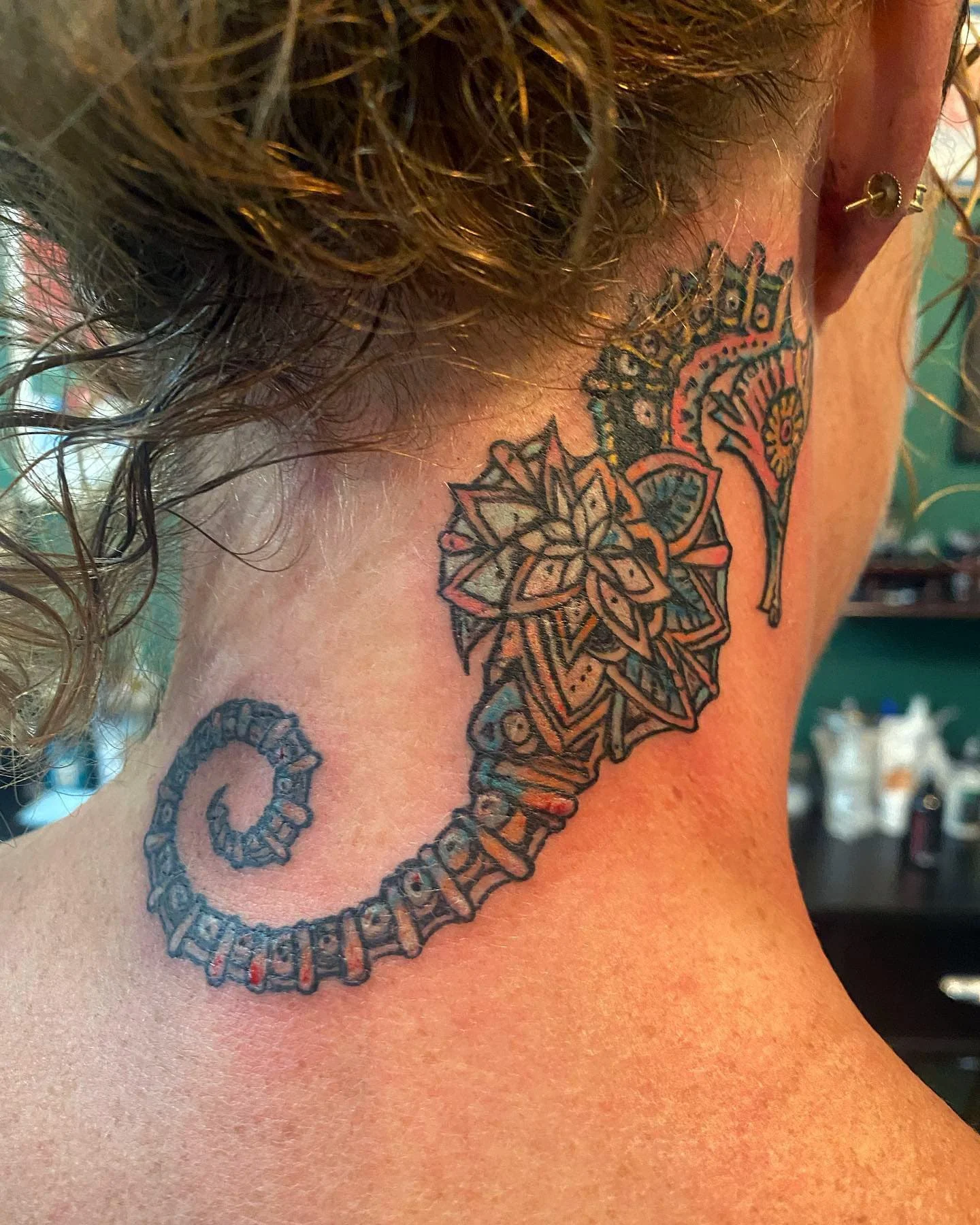 Small Earpiece Seahorse Tattoo Design