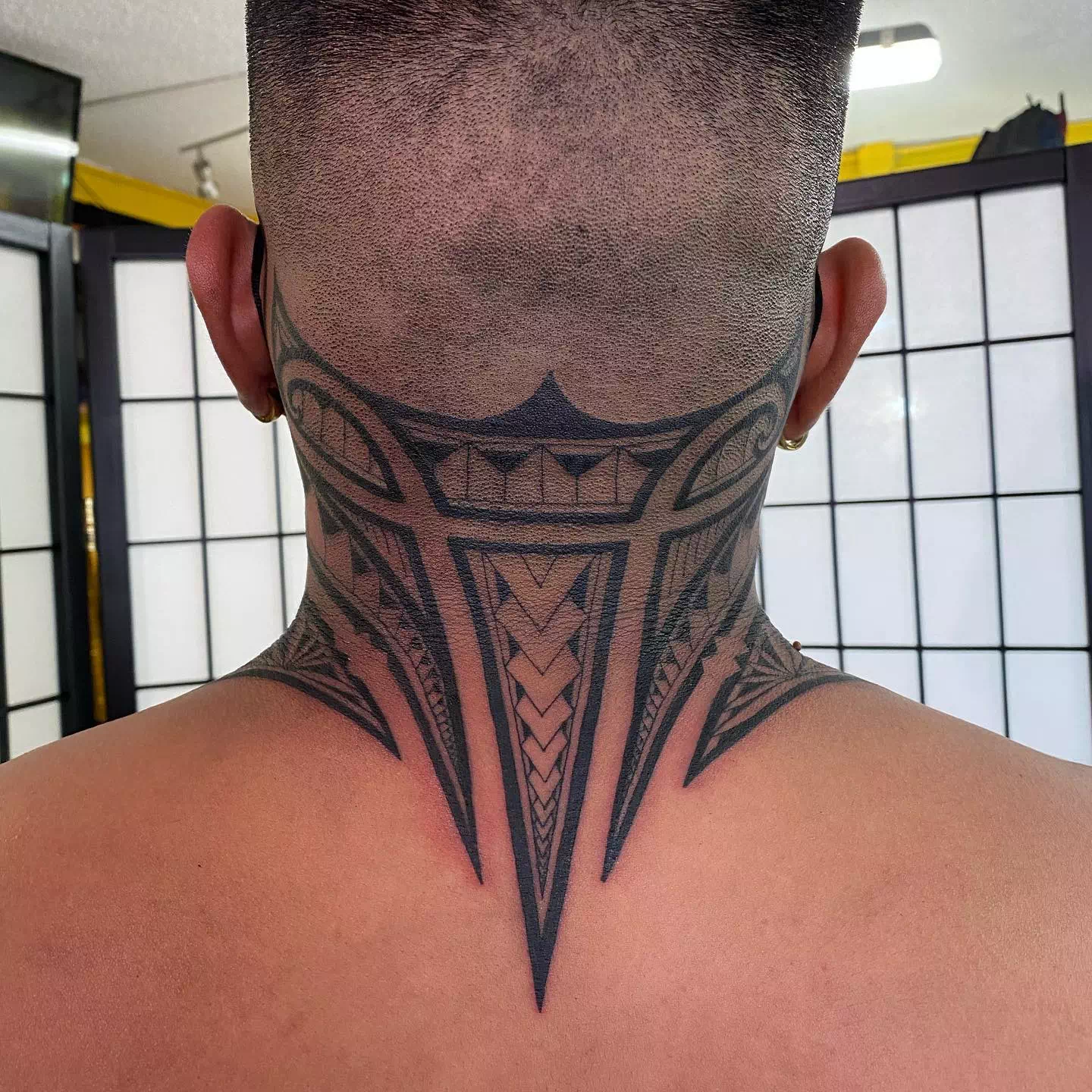 Tribal neck tattoo 3