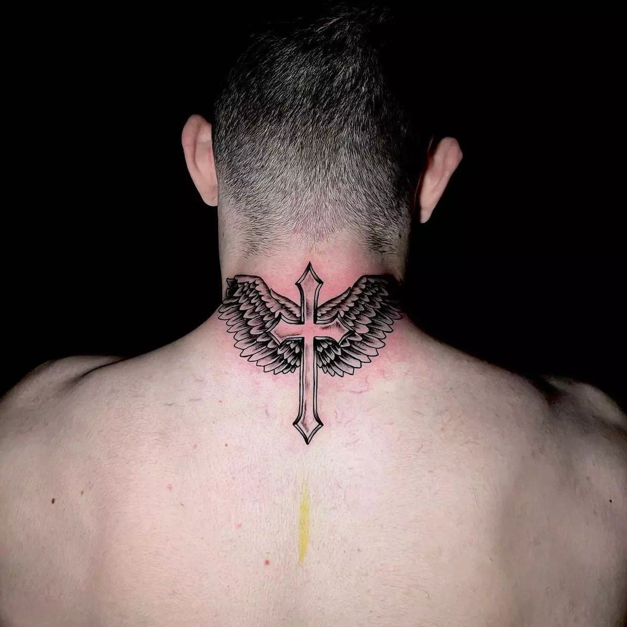 Wing neck tattoo 3
