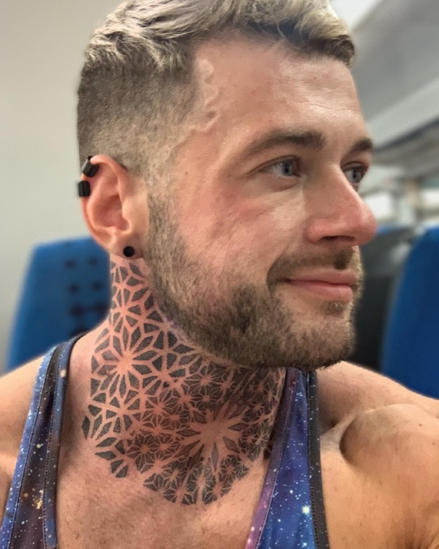 big tattoo on the neck of men