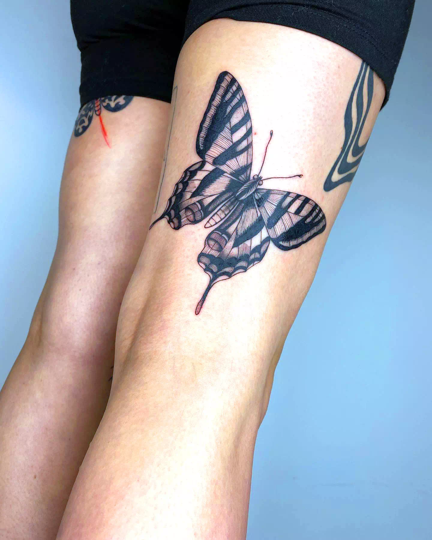Ideas de tatuajes de mariposas en la pantorrilla