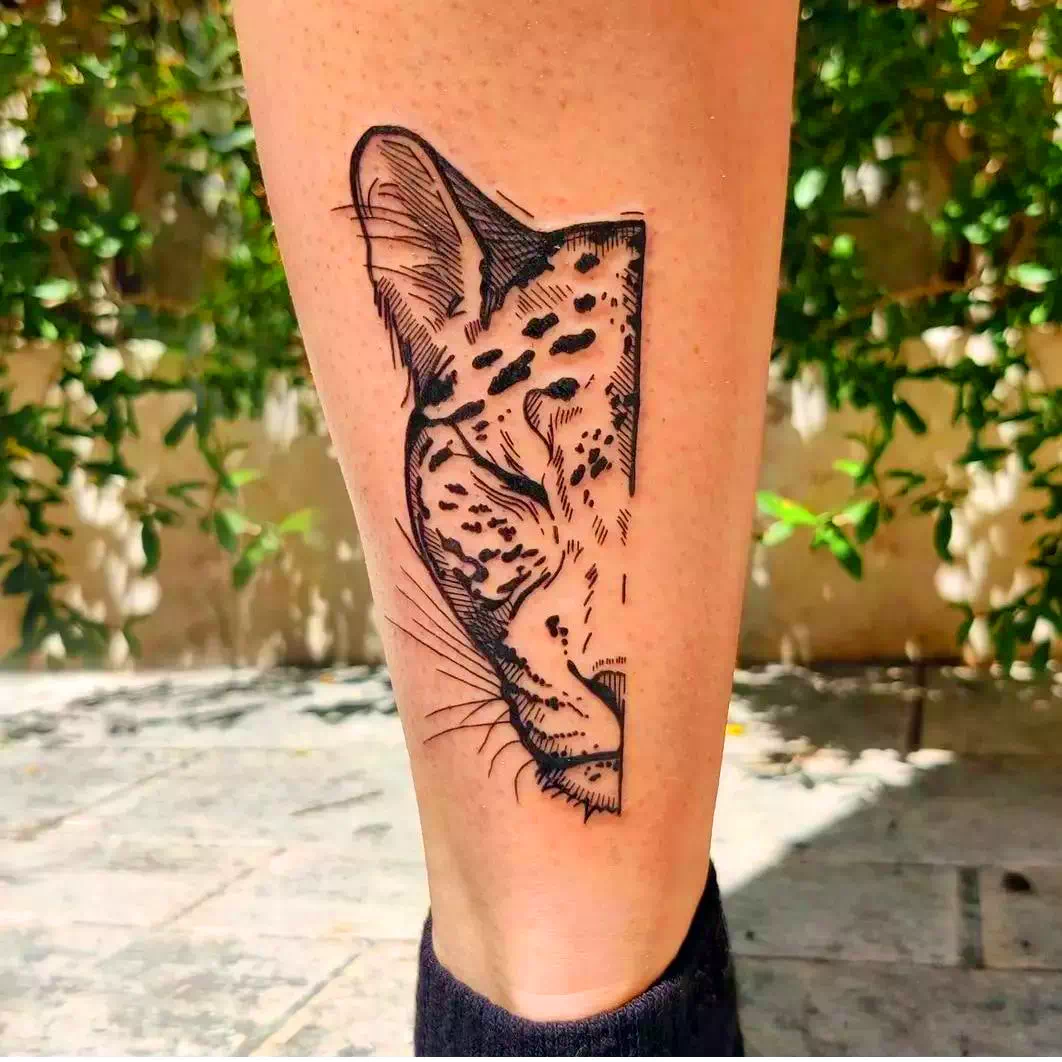 Tatuaje de guepardo en la pantorrilla 1