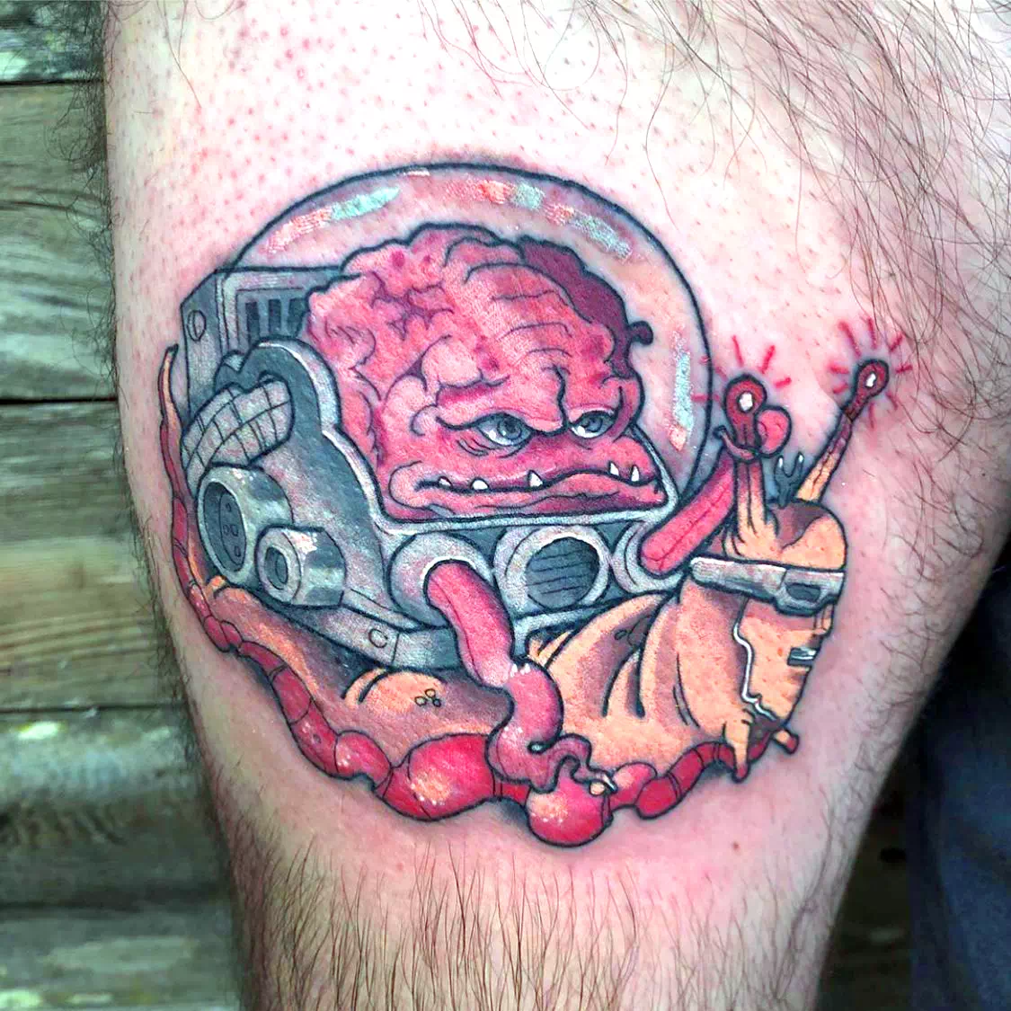 Colorful Red Snail Calf Tattoo 2
