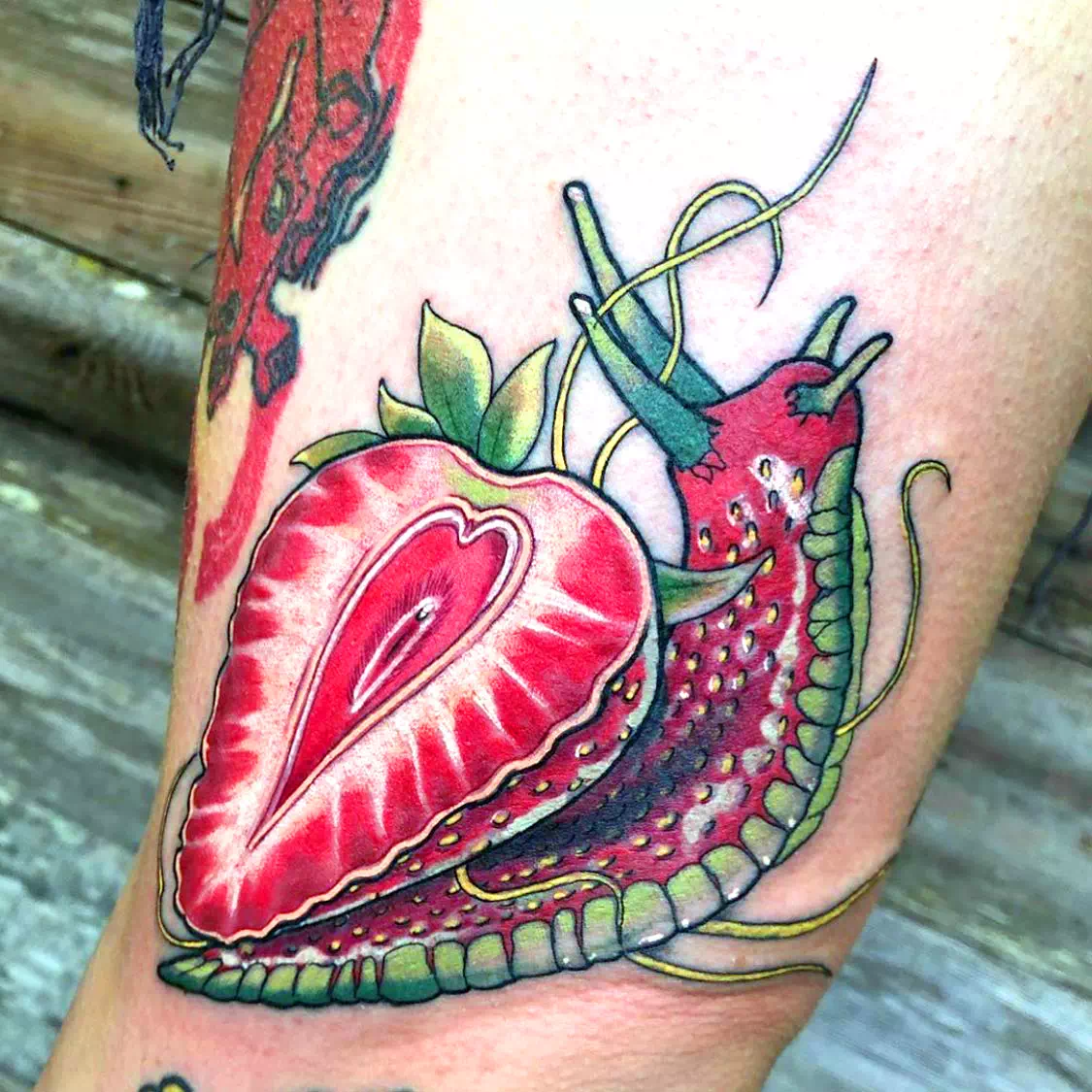 Colorful Red Snail Calf Tattoo 3