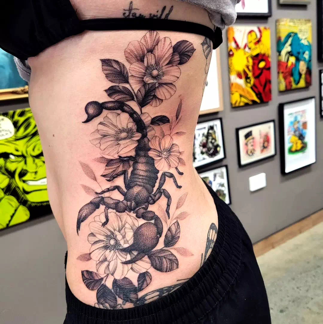 Feminine Floral Scorpio Tattoo