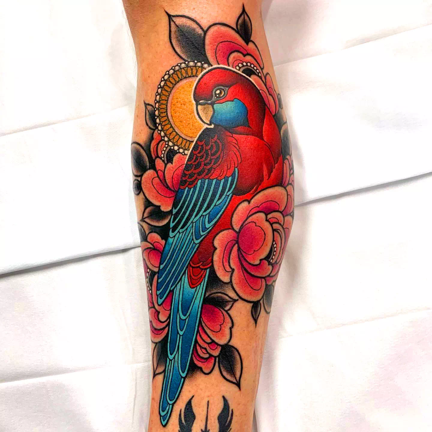 Red Parrot Calf Tattoo 1