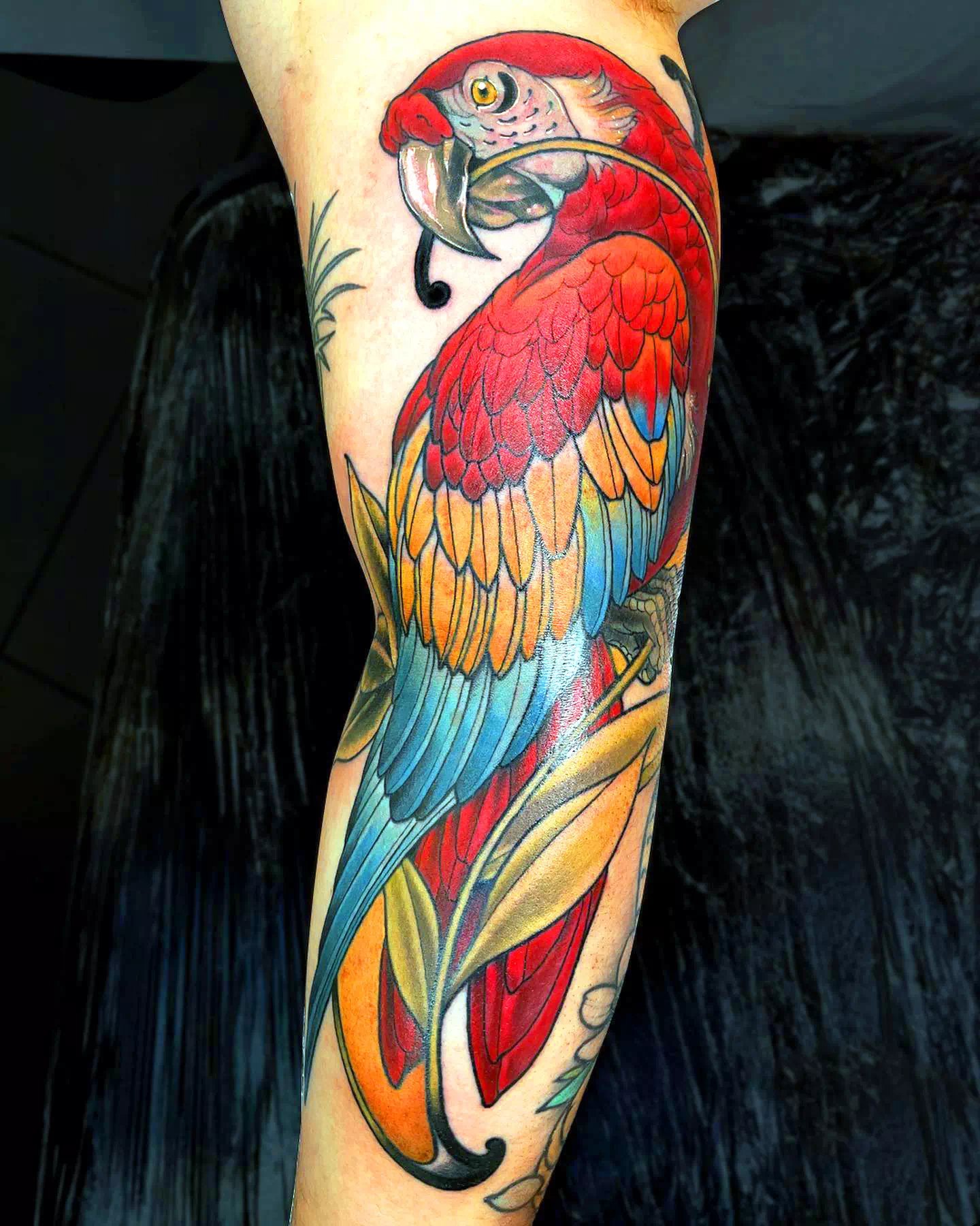 Red Parrot Calf Tattoo